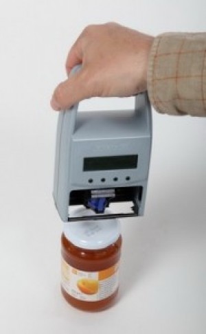 Hand-held ink jet printer for 2 line printing