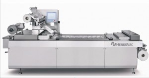 Automatic high capacity thermoforming machine