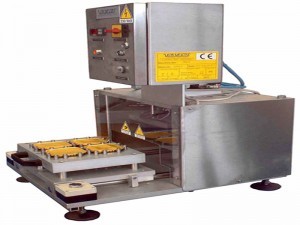 semiautomatic press tray packaging machine